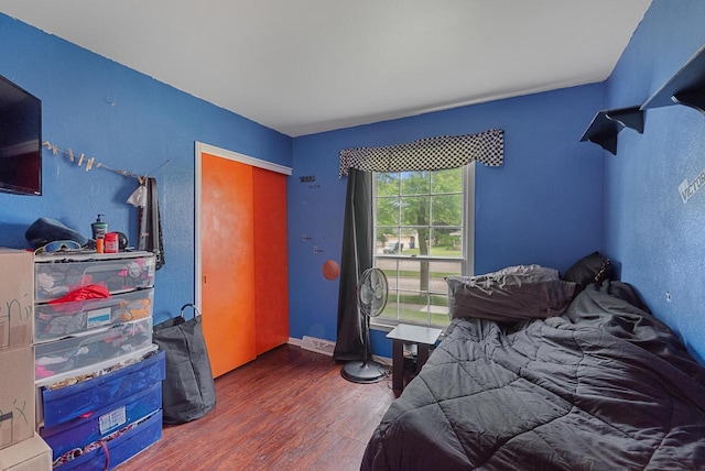 248 E Norport Dr, Port Washington, WI 53074 - bedroom featuring wood finished floors and baseboards