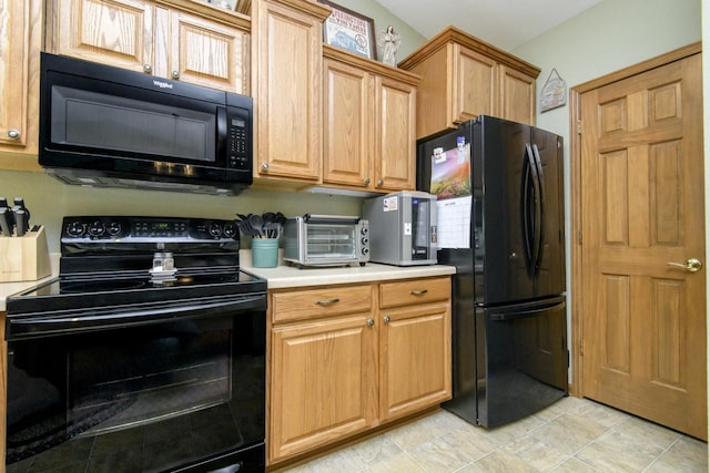 9245 S 54th St, Franklin, WI 53132 - kitchen featuring black appliances and light countertops