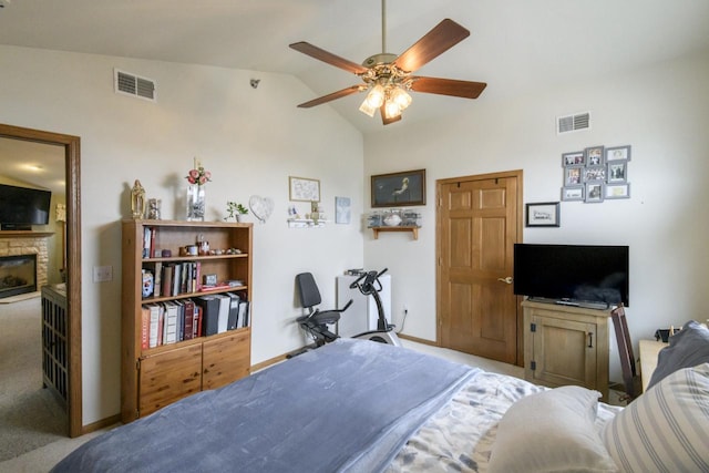 9245 S 54th St, Franklin, WI 53132 - carpeted bedroom featuring vaulted ceiling, a fireplace, and a ceiling fan
