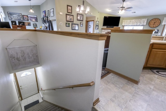 9245 S 54th St, Franklin, WI 53132 - kitchen featuring a ceiling fan, open floor plan, pendant lighting, and a chandelier