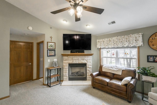 9245 S 54th St, Franklin, WI 53132 - living room featuring carpet flooring, ceiling fan, vaulted ceiling, and a fireplace