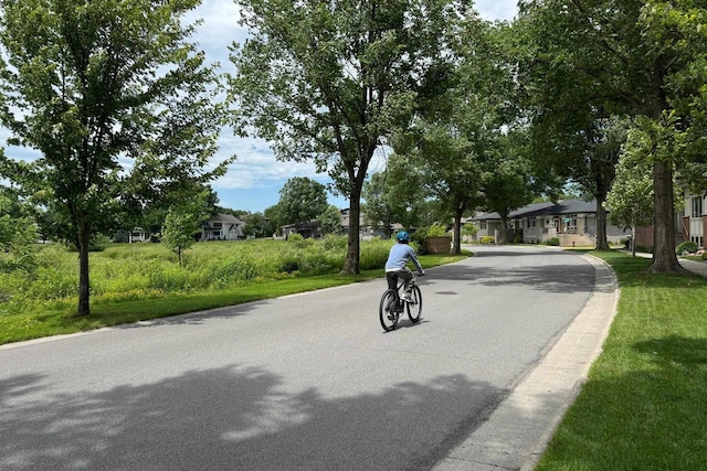 6846 Frank Lloyd Wright Ave, Middleton, WI 53562 - view of asphalt road featuring a residential view