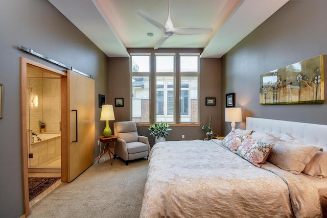 6846 Frank Lloyd Wright Ave, Middleton, WI 53562 - carpeted bedroom with connected bathroom and a ceiling fan