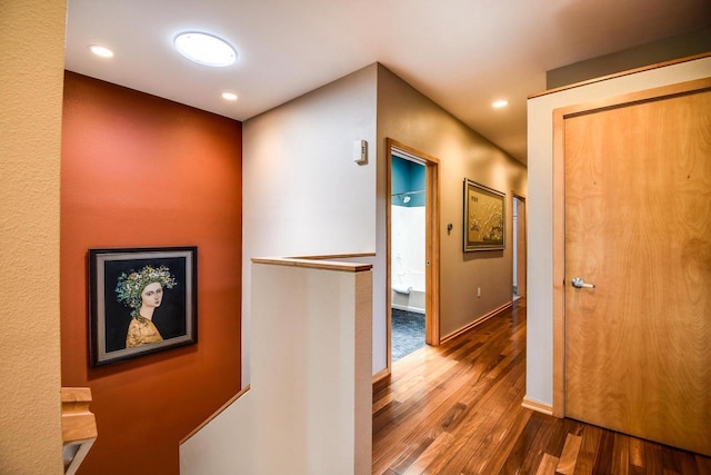 6846 Frank Lloyd Wright Ave, Middleton, WI 53562 - hallway featuring wood finished floors, an upstairs landing, and recessed lighting