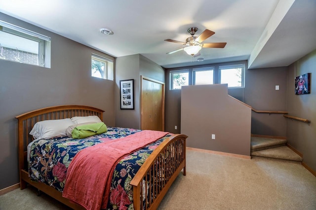 6846 Frank Lloyd Wright Ave, Middleton, WI 53562 - bedroom featuring carpet, multiple windows, and a ceiling fan