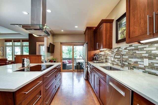 6846 Frank Lloyd Wright Ave, Middleton, WI 53562 - kitchen with appliances with stainless steel finishes, island range hood, healthy amount of natural light, light countertops, and recessed lighting