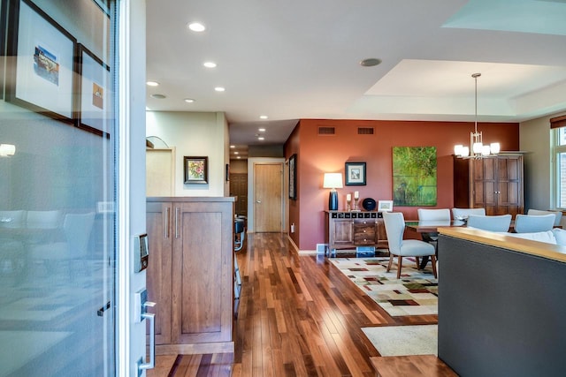 6846 Frank Lloyd Wright Ave, Middleton, WI 53562 - hall featuring a chandelier, hardwood / wood-style flooring, recessed lighting, and a tray ceiling