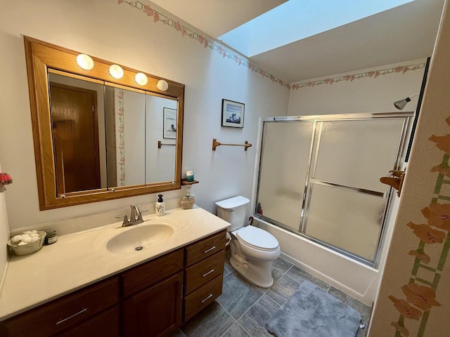 38630 Golf View Dr, Prairie Du Chien, WI 53821 - bathroom with vanity and shower / bath combination with glass door