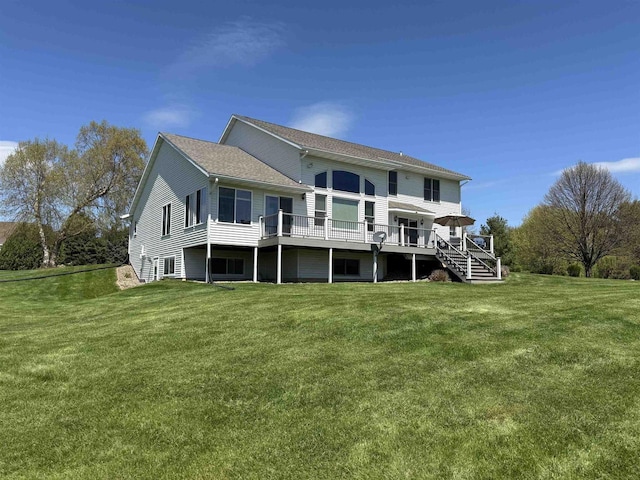 38630 Golf View Dr, Prairie Du Chien, WI 53821 - back of property with a wooden deck and a lawn