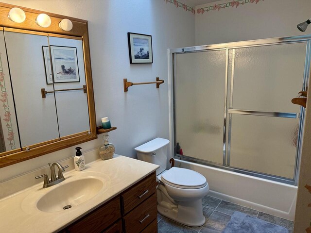 38630 Golf View Dr, Prairie Du Chien, WI 53821 - bathroom with vanity and enclosed tub / shower combo