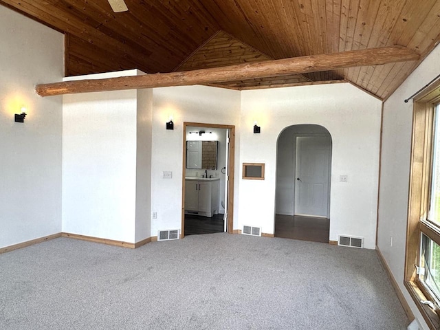 N5516 Polar Rd, Bryant, WI 54418 - spare room with arched walkways, wooden ceiling, vaulted ceiling, and carpet flooring