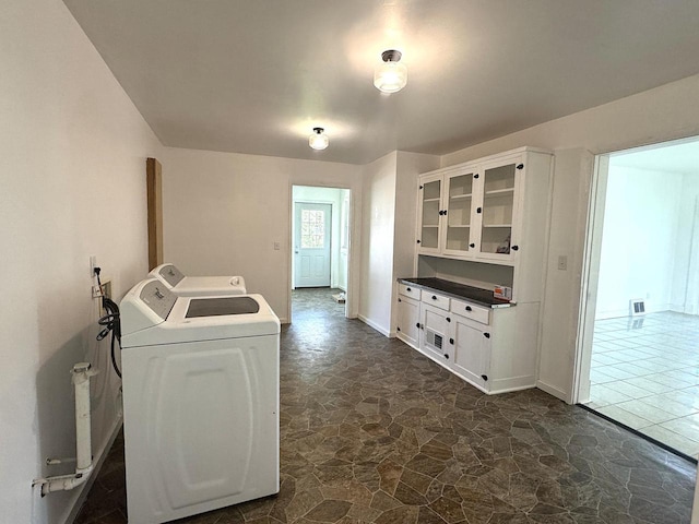 N5516 Polar Rd, Bryant, WI 54418 - laundry room with dark stone finish flooring and washer and dryer