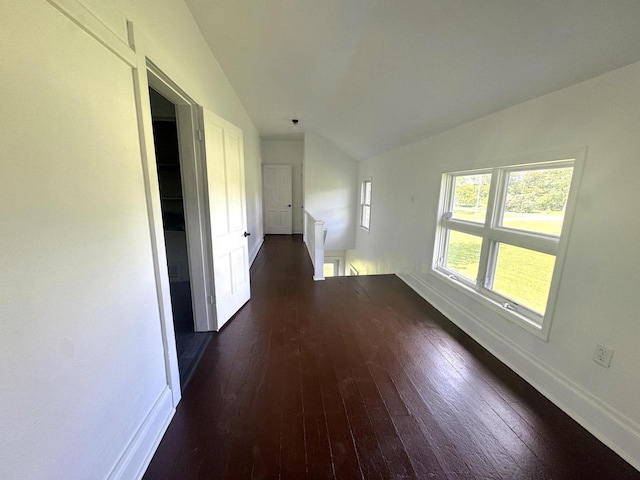 N5516 Polar Rd, Bryant, WI 54418 - unfurnished room with lofted ceiling and dark wood-type flooring