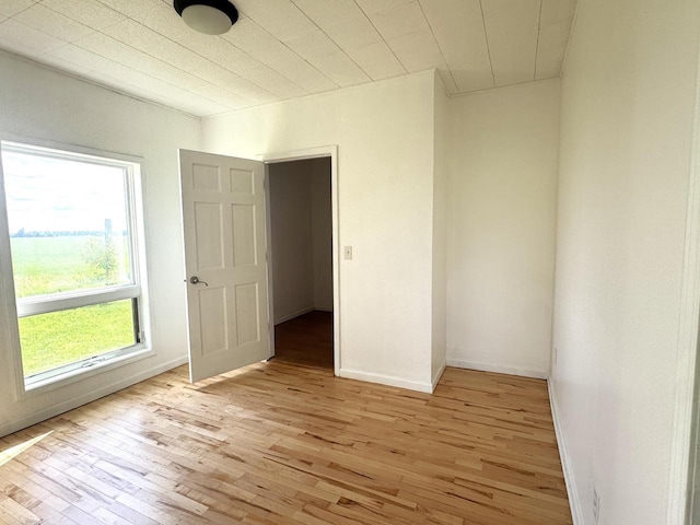 N5516 Polar Rd, Bryant, WI 54418 - spare room with light wood finished floors and baseboards