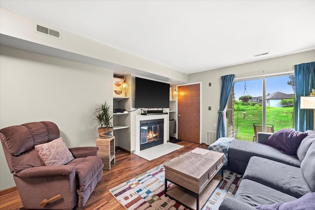 847 W Puetz Rd, Oak Creek, WI 53154 - living room with a fireplace with flush hearth and wood finished floors