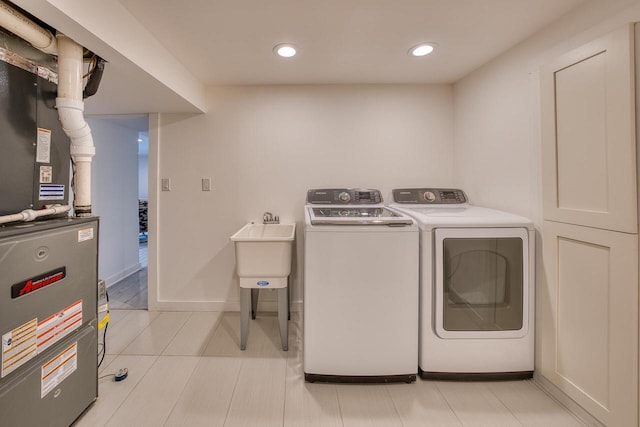 915 Mariane Ter, Lake Geneva, WI 53147 - laundry room featuring washer and dryer, recessed lighting, and heating unit