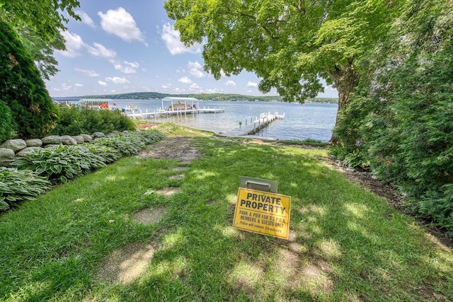 915 Mariane Ter, Lake Geneva, WI 53147 - view of yard featuring a water view and a boat dock