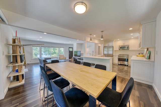 915 Mariane Ter, Lake Geneva, WI 53147 - dining area featuring recessed lighting and dark wood-style flooring