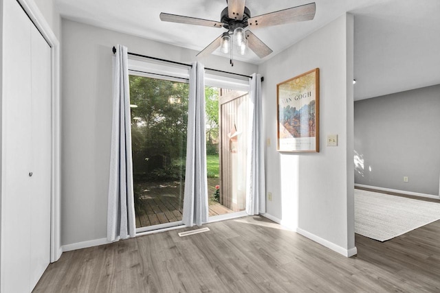 102 Crab Apple Ct, Appleton, WI 54914 - doorway to outside with wood finished floors and ceiling fan