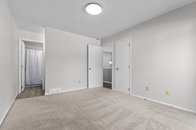 102 Crab Apple Ct, Appleton, WI 54914 - unfurnished bedroom featuring carpet floors and ensuite bathroom