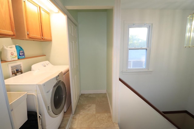 1503 St Lawrence Ave, Beloit, WI 53511 - laundry area featuring independent washer and dryer and cabinet space
