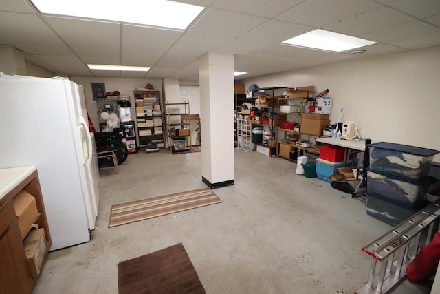 1503 St Lawrence Ave, Beloit, WI 53511 - below grade area with white fridge with ice dispenser and a drop ceiling