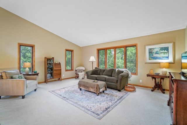 4129 Birch Crest Ln, Eau Claire, WI 54701 - living room featuring light colored carpet, plenty of natural light, and vaulted ceiling