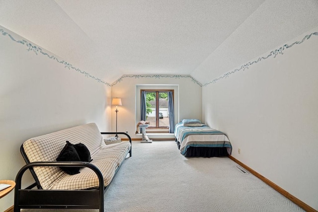 4129 Birch Crest Ln, Eau Claire, WI 54701 - carpeted bedroom with vaulted ceiling and a textured ceiling