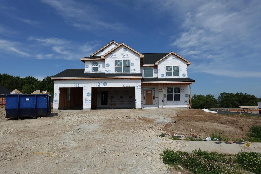 511 Woodside Ct, West Bend, WI 53095 - property under construction with covered porch