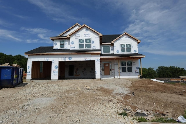 511 Woodside Ct, West Bend, WI 53095 - property under construction featuring covered porch and an attached garage