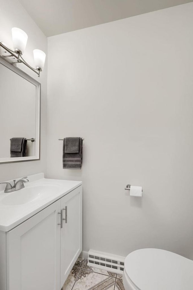 W2726 Marion St, Neshkoro, WI 54960 - bathroom with vanity, a baseboard radiator, and tile patterned floors