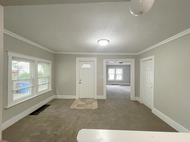 133 W 16th Ave, Oshkosh, WI 54902 - foyer with carpet and crown molding