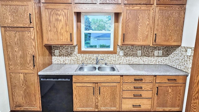 553 W 17th Ave, Oshkosh, WI 54902 - kitchen featuring black dishwasher, decorative backsplash, light countertops, and brown cabinets