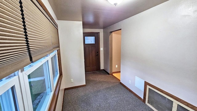 553 W 17th Ave, Oshkosh, WI 54902 - hall featuring baseboards and carpet flooring