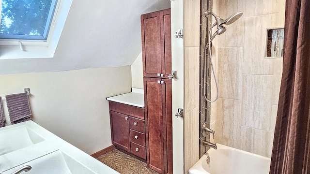 553 W 17th Ave, Oshkosh, WI 54902 - full bath with shower / tub combo, vanity, and lofted ceiling