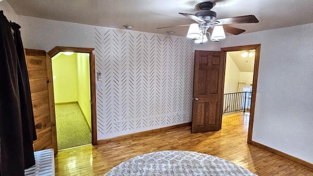 553 W 17th Ave, Oshkosh, WI 54902 - bedroom with light wood finished floors and a ceiling fan