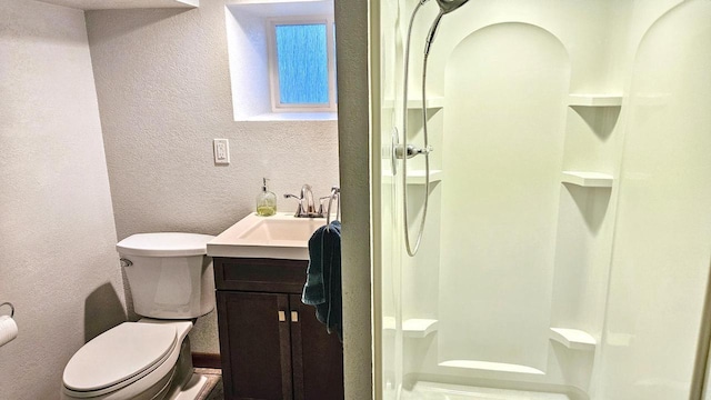 553 W 17th Ave, Oshkosh, WI 54902 - bathroom featuring a textured wall, vanity, and a shower