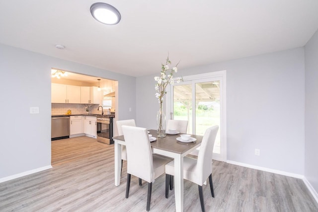 11114 8th Ave, Pleasant Prairie, WI 53158 - dining area with light wood finished floors and baseboards