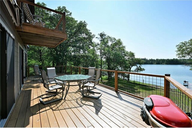 33516 No Mans Trl, Minong, WI 54859 - deck featuring a water view and outdoor dining area