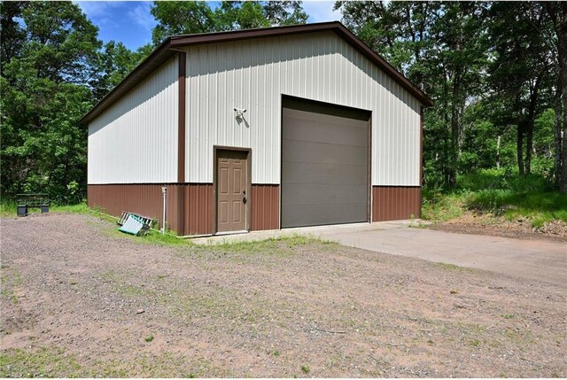 33516 No Mans Trl, Minong, WI 54859 - detached garage featuring driveway