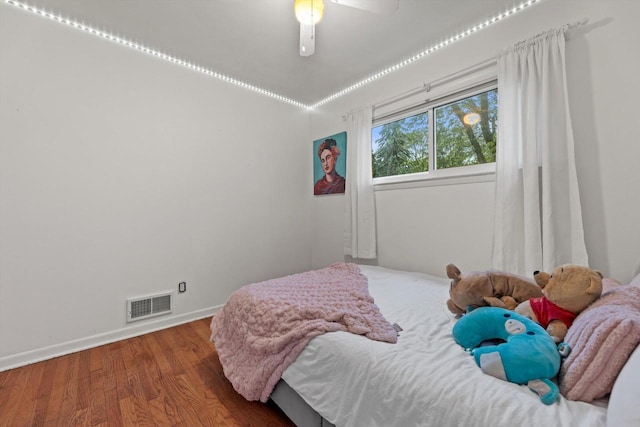 8088 N 65th St, Brown Deer, WI 53223 - bedroom featuring wood finished floors and ceiling fan