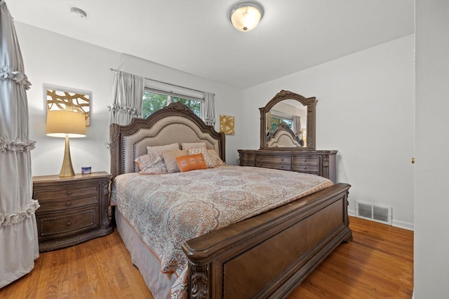 8088 N 65th St, Brown Deer, WI 53223 - bedroom with wood finished floors and baseboards