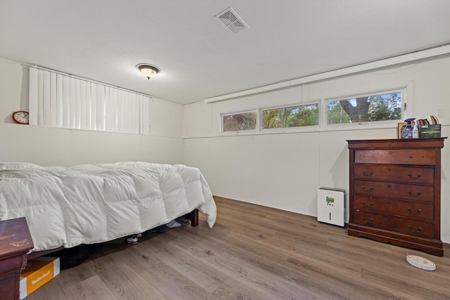 8088 N 65th St, Brown Deer, WI 53223 - bedroom with wood finished floors and baseboards