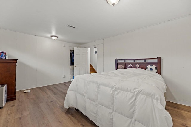 8088 N 65th St, Brown Deer, WI 53223 - bedroom with wood finished floors and baseboards