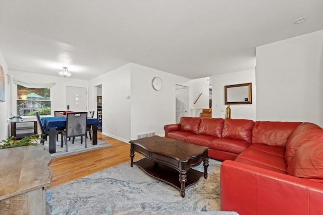 8088 N 65th St, Brown Deer, WI 53223 - living area featuring wood finished floors and baseboards