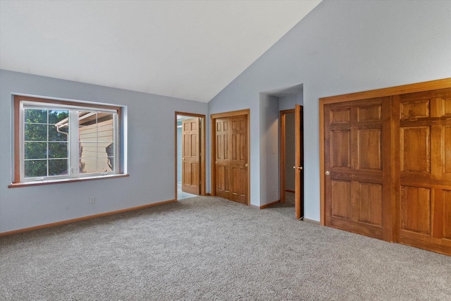 2975 River Birch Dr Unit F, Brookfield, WI 53045 - unfurnished bedroom with carpet flooring, multiple closets, and high vaulted ceiling