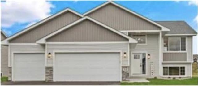 475 Lookout Ln, Saint Croix Falls, WI 54024 - view of front of house with an attached garage and driveway