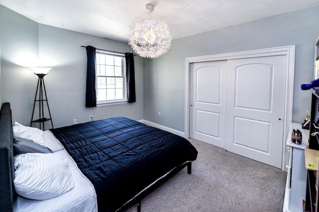 N165W20576 Berry Patch Rd Unit 702, Jackson, WI 53037 - carpeted bedroom featuring a chandelier and a closet