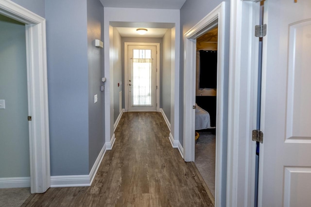 N165W20576 Berry Patch Rd Unit 702, Jackson, WI 53037 - entryway with dark wood-style floors and baseboards