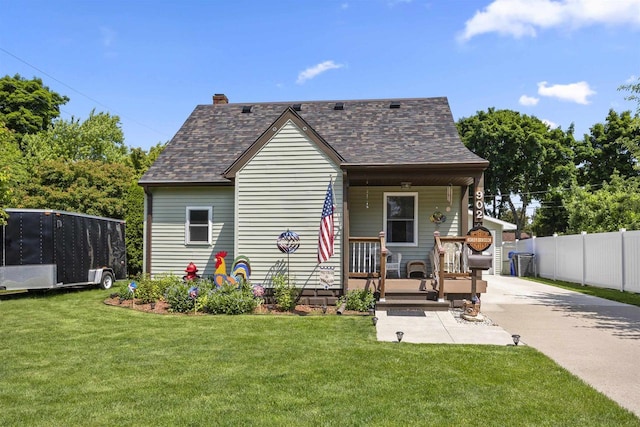 902 E Fremont St, Appleton, WI 54915 - view of front of property featuring a porch, a chimney, roof with shingles, and concrete driveway